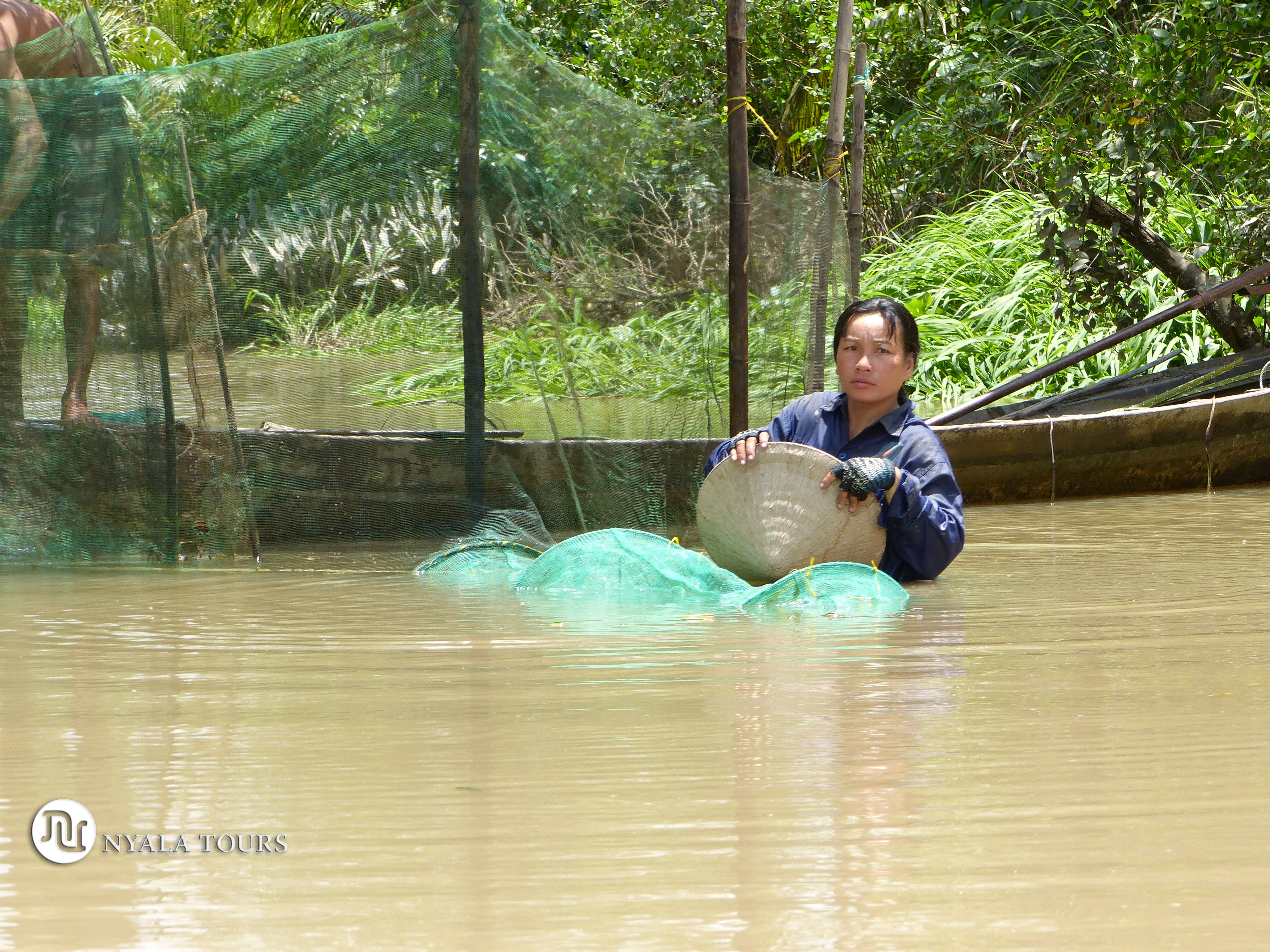 Fishing women Delta de Mekong, Can Tho, Vietnam