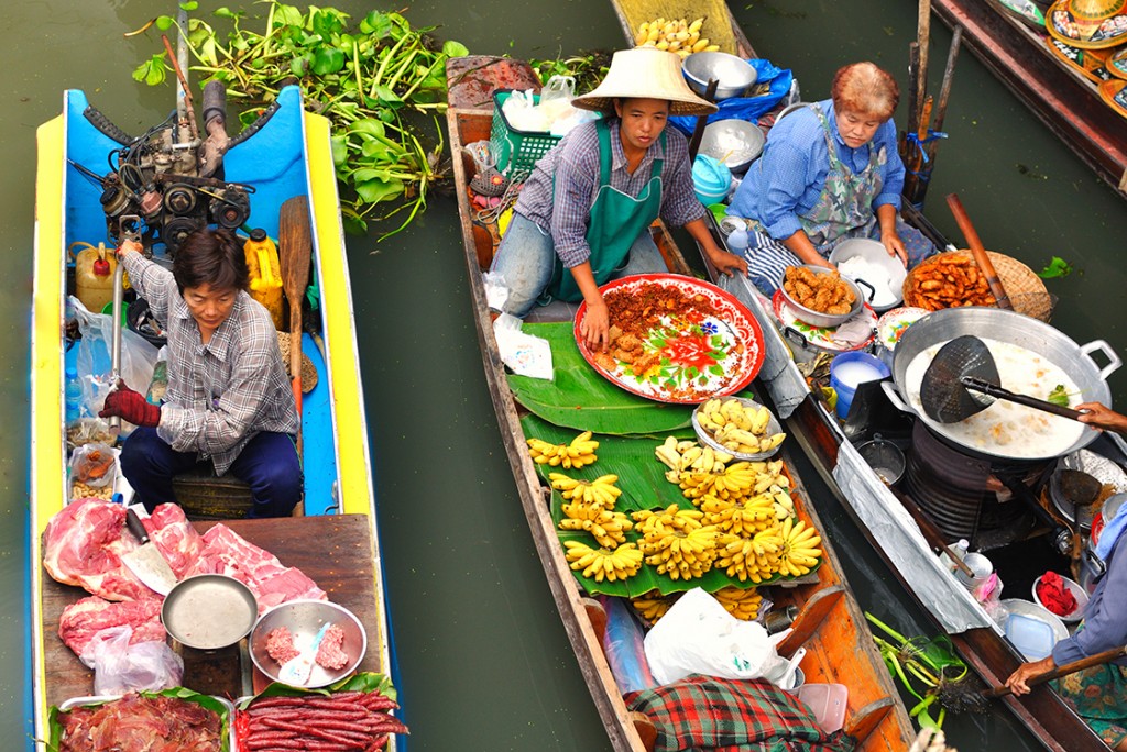 Damnoen Saduak, Thailand - March 07 2011 - Floating markets in Damnoen Saduak, Thailand. Until recently, the main form of trade, now mostly a tourist attraction